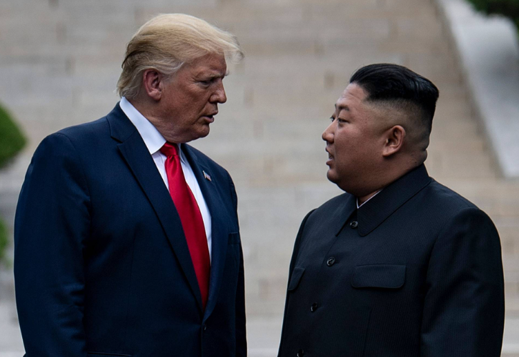 US President Donald Trump and North Korean leader Kim Jong Un stand on North Korean soil while walking towards South Korea, in the Demilitarised Zone, June last year.