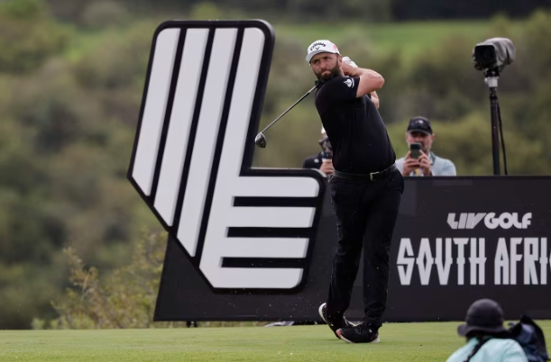 Jon Rahm hits a drive during a LIV Golf event in South Africa.