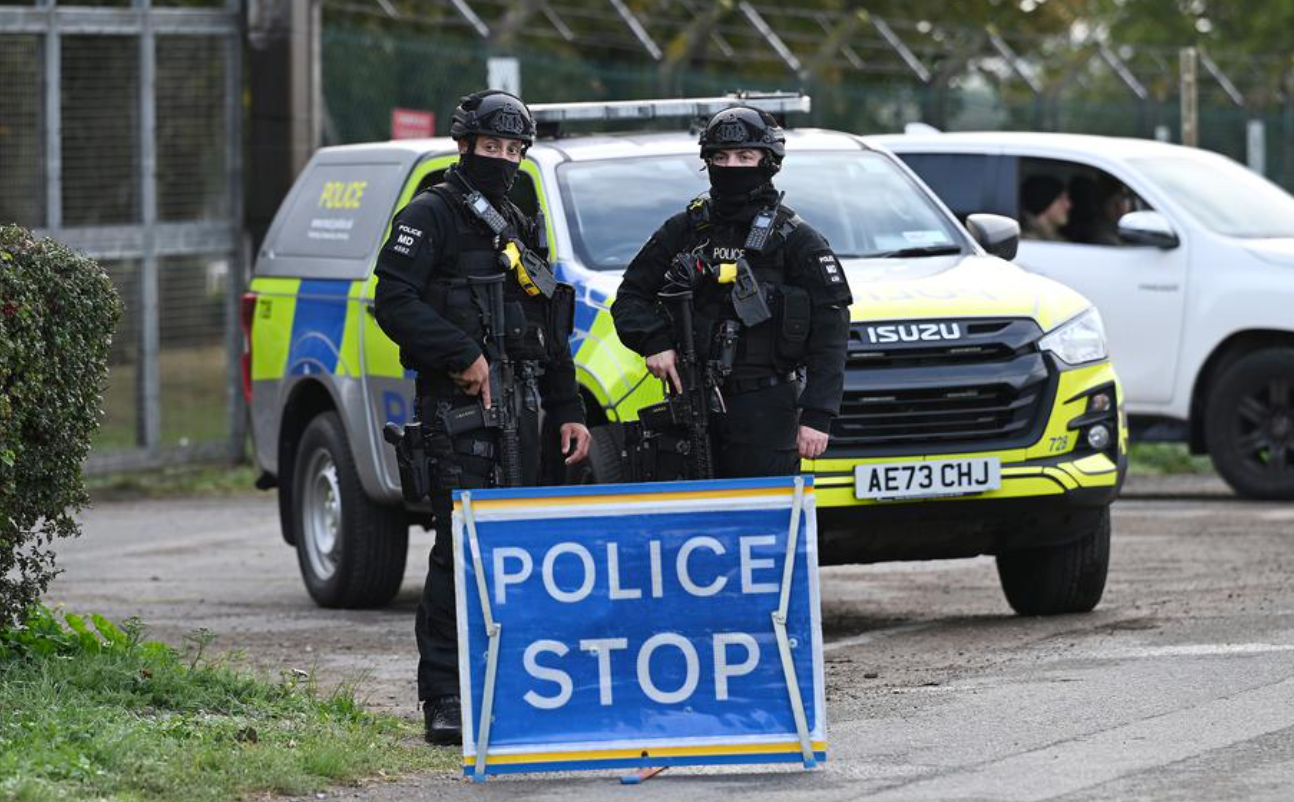 UK police stand guard at the airforce base used by the US.