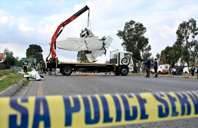 JMPD emergency services clear up the scene at yesterday's double-collision scene.