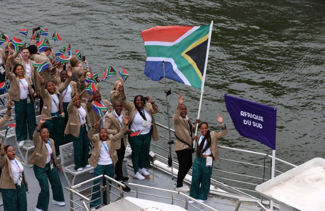 Team SA on the Seine at the start of the Paris Olympics.