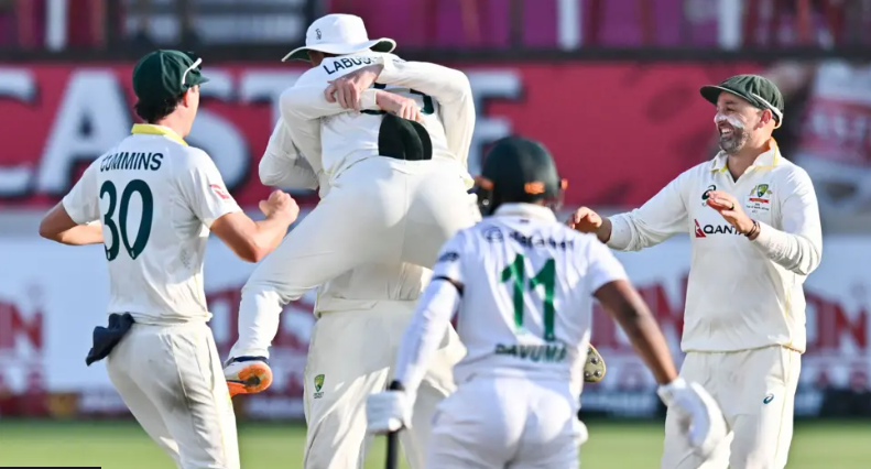 Australia celebrates the wicket of Proteas skipper Temba Bavuma.